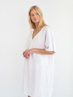 "PEONY is a loose fitting v-neck linen midi dress. DETAILS - Knee length - Kaftan silhouette - Short sleeve - V neckline - Pockets available upon request - Oeko-Tex certified 100% lightweight linen - Cut and sewn to order just for you in our studio COLOR - White, you can also choose other colors above - Fabric samples are available here https://www.etsy.com/listing/586569696/linen-fabric-samples SIZING & FIT - Fits true to size - Length (shoulder to hem) is approximately 37.5 inches / 95 cm Simple Summer Dress, Simple Summer Dresses, Linen Midi Dress, Linen Jacket, Short Sleeve Tunic, Comfortable Tops, Loose Shorts, Mini Dresses Summer, Etsy Fashion