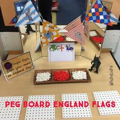 the peg board england flags are on display for children to use in their school's crafts