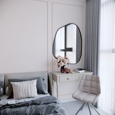 a bed room with a neatly made bed and a large round mirror on the wall