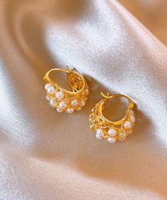 Fine Gold Metal Overgild Pearl Hollow Out Hoop EarringsMade of fine Metal Overgild Pearl Hollow Out.Measurement: 1.8cm/0.702" * 1.5cm/0.585". Matches easily with daily hairstyle, dresses & Shirts Gold Huggie Hoop Earrings With Plating, Gold Hoop Clip-on Earrings For Wedding, Gold Hoop Pearl Earrings For Wedding, Gold Huggie Jewelry For Parties, Gold Huggie Earrings For Party, Gold Small Hoop Earrings For Party, Gold-tone Hoop Earrings For Wedding, Gold Small Hoop Clip-on Earrings For Anniversary, Gold Small Hoop Pearl Earrings For Anniversary