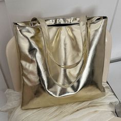 Silver Metallic Luster Pu Leather Medium Capacity Tote Bag * Metallic Gold * Pu Leather * Zipper Closure * Double Handle * Square Bag * 100% Polyurethane Metallic Shoulder Bag For Daily Use, Casual Gold Bags With Zipper Closure, Gold Faux Leather Shoulder Bag With Large Capacity, Gold Large Capacity Faux Leather Bag, Casual Gold Shoulder Bag For Errands, Metallic Luster, Leather Zipper, Square Bag, Metallic Gold