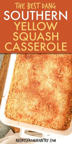 the best dang southern yellow squash casserole in a white dish on a wooden table