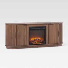 an entertainment center with a fireplace in the middle