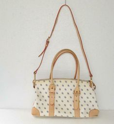 Authentic Dooney & Bourke Signature off-white pebble leather medium satchel bag Authentic Dooney & Bourke Signature off-white pebble leather medium satchel bag Description Authentic Dooney & Bourke Signature off-white pebble leather medium satchel bag as pictured. The bag is in great condition, looks like was used once or twice only…Measure app. 13”L x 8”H x 5”W Features: Beige leather trim 2 removable adjustable handles 9 max. drop Removable adjustable leather strap with chrome hardware 16” max White Pebbles, Chrome Hardware, Dooney And Bourke, Hanging Bag, Dooney & Bourke, The Bag, Satchel Bag, Louis Vuitton Bag Neverfull, Leather Trim