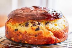 a close up of a cake on a cooling rack