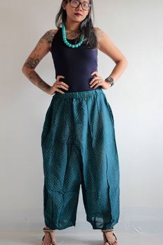 "Thin and flowvy. Perfect for hot days! Made from Indian cotton-voiled fabric. Lovely, breathable and so so flown. With print that looks hand-painted. Thin but not a see-thru. Leisuring lounge pants style. So comfortable and earthy. Drop crotch with.2 pieces of leg patch together in an untraditional way. We play around with the pattern and it turns out good! Elastic waist, 2 side pockets, gathered a bit on the bottom hem for volume. Measurement; Waist (elastic) 24-28 Hip max 36 Length out-seam 3 Pants Summer, Womens Capris, Pants Style, Summer Pants, Indian Cotton, Hot Days, Color Swatches, Cotton Pants, Lounge Pants