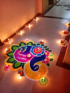 a decorated floor with lit candles on it