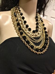 Multiple Layers Chains Necklace. Gold and Black Color | Etsy Elegant Black Chain Link Jewelry, Trendy Beaded Chain Necklace For Party, Trendy Black Chain Link Jewelry, Black Chain Link Necklace With Adjustable Chain, Black Necklace With Gold Chain Link Detail, Black Necklace With Adjustable Chain, Black Necklace With Gold Chain Link, Trendy Black Jewelry With Gold Chain, Black Chunky Chain Necklace