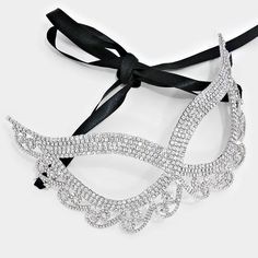 Lynn Swirl Cat Eye Crystal Silver Masquerade Mask.Description:This Swirl Romantic Cat Eye Masquerade Mask is created with best quality sparkling Crystal and Black Ribbon Tie. This gorgeous piece will look elegant and beautiful for the Masked Ball, Mardi Gras, Halloween, Holiday Party and Vintage Wedding. Item: BSW-M11193S-CLRMetal: Silvertone PlatedGemstone Color: ClearGemstone: Top Quality CrystalStone Cut: RoundMask Size: 6.75in W (171mm) x 4.2in H (107mm)Mask Inner Width: 8.3in W (210mm)Back Elegant Fitted Masquerade Mask For Mardi Gras, Elegant Masquerade Mask For Formal Occasions, Elegant Fitted Masquerade Mask For Costume Party, Elegant Silver Masquerade Mask For Wedding, Elegant Silver Masquerade Mask, Elegant Fitted Masquerade Mask, Elegant Eye Mask For Masquerade, Elegant Masquerade Mask For Party, Elegant Fitted Masquerade Mask For Party