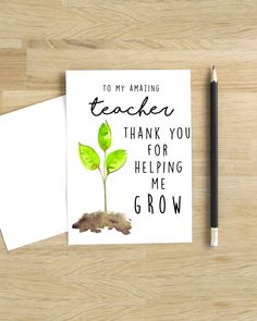 a card that says to my amazing teacher thank you for helping me grow on it