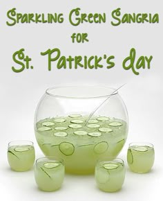 green sangria for st patrick's day with cucumbers in a bowl