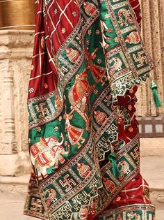 <ul>
<li style="text-align: justify;"><span data-preserver-spaces="true">Spark a unique dignity to your essence by drapping panetar saree in red hue made with silk material accomplished with colored peacock, elephant, kalash, swastik motifs on it border and also has heavy embellished pallu with doli/ baraat scene and saubhagyawati bhava written on lace elevate pallu border with thread tessels.  </span></li>
<li style="text-align: justify;"><span d Traditional Drape Blouse Piece For Wedding Festivals, Traditional Wedding Festival Blouse Piece, Red Traditional Wear For Wedding Festival, Wedding Dupatta With Motifs For Festivals, Red Traditional Wear With Intricate Embroidery For Celebration, Festival Wedding Dupatta With Motifs, Wedding Red Blouse Piece With Traditional Patterns, Red Embroidered Dupatta For Celebration, Red Ceremonial Blouse Piece For Festive Occasions