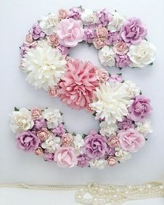 the letter s is made up of flowers