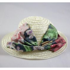 Sweet and stylish, this vintage doll size straw-look hat features a charming floral bow, perfect for adding a touch of elegance to your doll's outfit.  * Lightweight woven straw-look material * Decorative floral bow Measurements: Inside Circumference 10.5 in / 27 cm Width 6.25 in / 16 cm Crown Height 2 in / 5 cm Condition: Pre-Owned Good Some slight bends in the brim. Please see photos for condition.  We try to show all details and flaws accurately in the photos, but if you have additional questions, please let us know. Doll Hat, Floral Vintage, Vintage Doll, Doll Toys, Clothing Items, Straw, Action Figures, Doll Clothes, Birthday Gifts