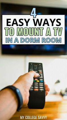 a hand holding a remote control in front of a tv with the text 4 easy ways to mount a tv in a dorm room