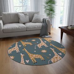 a living room with a couch, chair and giraffe rug