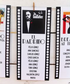 three movie claps hanging on a wall with the names of movies written in spanish