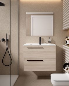 a bathroom with a sink, toilet and shower in it's own area is shown