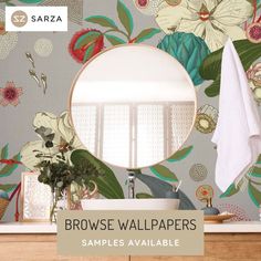 a bathroom with flowers on the wall and a round mirror above it that says browse wallpapers samples available