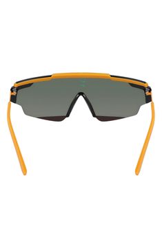 Shield sunglasses in an oversized silhouette offer sporty style with the comfort of soft nose pads and rubber-tipped temples. 64mm lens width; 14mm bridge width; 140mm temple length 100% UV protection Co-injection/metal Imported Sporty Polarized Sunglasses For Sports Events, Sporty Sunglasses With Uv Protection For Sports Events, Sporty Sunglasses With Uva Protection For Sports Events, Sporty Shield Sunglasses For Outdoor Activities, Anti-reflective Shield Sunglasses For Sports, Anti-reflective Shield Sunglasses For Outdoor Use, Anti-reflective Polycarbonate Shield Sunglasses For Outdoor, Outdoor Anti-reflective Shield Sunglasses In Polycarbonate, Functional Polycarbonate Shield Sunglasses For Outdoor Activities