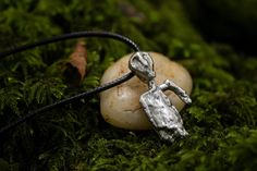 This is part of our pewter jewellery series. The casting is produced using a digital 3D model based on data from the original palaeolithic figurine.  The listing includes a unique hand finished pewter casting and waxed cotton necklace clasp (42cm long). One of the only male depicting pieces from the palaeolithic, the Brno puppet (a once workable marionette), is among various grave goods possibly associated with the burial of a Shamen from the Pavlovian culture. The Ivory carved original measured Pewter Casting, Pewter Jewelry, Cotton Necklace, Necklace Clasp, 3d Modelle, Necklace Clasps, Casting Jewelry, Brno, Waxed Cotton