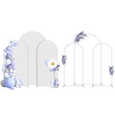 a set of white and blue decorations with flowers on the top, along with an arch