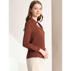 This shirt is elegant and charming for workwear or a day-to-night look, with a cut-out v-neck and unique shoulder details. No-see-through chiffon fabric and stylish v-neck make it a perfect choice for work, office, and daily wear. Pair this work office shirt with a pencil skirt, work pants, or casual jeans. The return of a classic, this button-up shirt is cut from in a chiffon sateen in an always flattering fit-and-flare silhouette. Model Body Size: Height: 5'9", Chest: 33 inches, Waist: 24 inch Classic V-neck Blouse For Semi-formal Occasions, Elegant V-neck Blouse For Office, Elegant V-neck Top For Business Casual, Elegant Blouse With Lapel Collar For Business Casual, Chic Notched Neckline Tops For Office, Chic Office Tops With Notched Neckline, Chic Blouse With Lapel Collar, Formal V-neck Shirt With Buttons, Formal V-neck Shirt With Button Closure