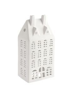 a white ceramic house shaped object on a white background