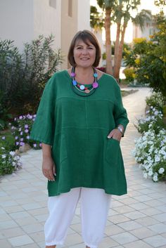 Beautiful Italian Heavy Linen Plus Size Tunic Top. One of our original classics that never dates. It hangs beautifully and is a firm favourite! Round Neck Quirky Design Front Pockets 3/4 length Sleeves 100% Heavy Quality Italian Linen Various colours available Size 2 - UK 24 26 28 30/32 Bust: 60 inches (152 cm) Hips: 72 inches (183 cm) Length: Shoulder to front middle - 33 inches (83 cm) Made in Italy Italian Linen Dress, Linen Tunic Shirt, Tunic Tops Summer, Linen Tunic Dress, Linen Tunic Tops, Lagenlook Style, Summer Tunics, Linen Tunic, Plus Size Leggings