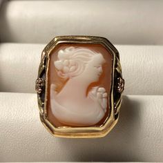 Vintage (1940s) Hand Carved Cameo Ring, Set In 10k Yellow Gold. Size 5. Total Face Measures 3/4 X 11/16. Cameo Measures 7/16 X 9/16. Vintage 14k Gold Cameo Rings, Art Deco Cameo Ring For Collectors, Art Deco Cameo Ring Collectible, Art Deco Cameo Collectible Rings, Vintage Cameo Rings For Collectors, Vintage Cameo Rings For Wedding, Vintage Yellow Gold Cameo Rings, Vintage Gold Cameo Ring, Vintage Cameo Engraved Ring For Formal Occasions