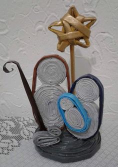 an artistic arrangement made out of paper towels and scissors