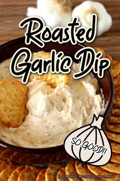 roasted garlic dip with crackers in a bowl