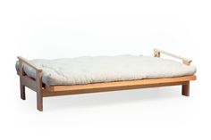 a wooden bed frame with a white mattress on the top and bottom part, in front of a white background