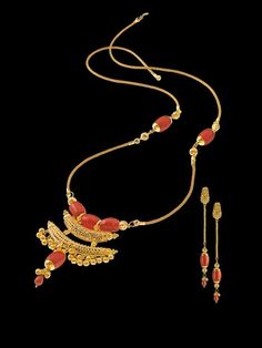 Jugal Bandi Necklace : A duet of gold and fire-red corals, this ultra light casual necklace carries the charm of a mangal-sutra but it works equally as an ornament for festive occasions. Red Coral Necklace Indian Gold, Coral Necklace Indian, Coral Necklace Indian Gold, Mangal Sutra, Antique Gold Jewelry Indian, Red Coral Necklace, Antique Jewellery Designs