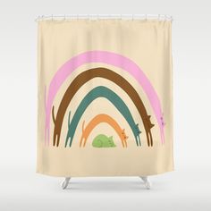 a shower curtain with animals and rainbows on it