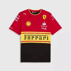 a red and black t - shirt with the word ferrari printed on it's chest