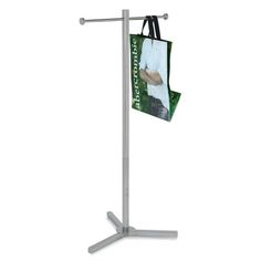 a metal pole with a bag hanging from it's side and a magazine holder on top