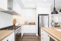 the kitchen is clean and ready for us to use in its new owner's home