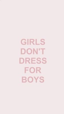 the words girls don't dress for boys written in pink on a white background