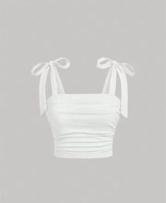 Step into summer with grace in this chic white crop top. The ruched design adds texture, while the tie-up shoulder straps allow for a customizable fit. Whether you're strolling on the beach or enjoying a rooftop brunch, this versatile piece is a must-have. Made from stretchable fabric, it's comfortable and stylish. Elevate your wardrobe with this minimalist yet eye-catching top!  😊🌟 Png Tops, Wide Straps Top, Tie Up Crop Top, Cute Summer Tops, Women Tank Tops, Plus Size Tank Tops, White Bow, Teenage Fashion Outfits, White Crop Top