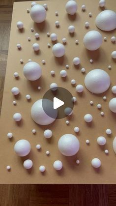 a table topped with lots of white balls