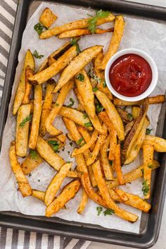 french fries with ketchup on a tray