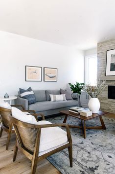 a living room filled with furniture and a fire place