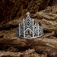 This Gothic Cathedral Ring embodies an air of mystery and elegance, perfect for those with a love for the dark and timeless. Crafted from 925 sterling silver with intricate medieval-style details, this gothic ring - castle is a unique and stunning choice as an engagement ring or everyday accessory. The intricate design is reminiscent of ancient architecture, making it the perfect Catholic gothic piece to add to your collection. Make a statement with this bold and statement ring that captures the Halloween Rings Jewelry, Vampire Ring, Cathedral Ring, Witch Rings, Fantasy Ring, Halloween Ring, Gothic Ring, Silver Wedding Ring, Gothic Cathedral