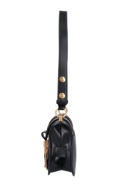 The Balmain Blaze Leather Shoulder Bag in black boasts an adjustable top leather shoulder strap for added convenience, secured with a snap flap closure. Its gold flap logo and double buckle detail on the front add a touch of sophistication. Plus, the bag features a flat back pocket and interior flat pocket within the spacious main compartment. Size and fit: H 6"/15cm X L 9"/23cm X D 2.75"/7 cmStrap span: 24.9"/63 cmComposition: 100% Calfskin LeatherHardware: Golden metalSignature dust bag includ Gold Shoulder Bag With Logo Hardware For Travel, Office Crossbody Shoulder Bag With Logo Hardware, Office Shoulder Bag With Logo Hardware, Business Crossbody Shoulder Bag With Logo Hardware, Designer Business Shoulder Bag With Brass Hardware, Luxury Travel Shoulder Bag With Logo Hardware, Evening Crossbody Flap Bag With Brass Hardware, Leather Flap Bag With Logo Hardware For Everyday Use, Black Shoulder Bag With Metal Logo For Everyday Luxury