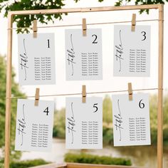 the seating cards were hung on clothes pins