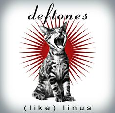 a cat with its mouth open and the words deftones like linus on it