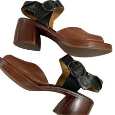 Pep Monjo Artisan Handcrafted Leather Colorblocked Sandal In Black And Cognac Leather With Wood Solid Wood Heel And Buckle Closure At Ankle. Heel Is Approx 2.5 Inches And Platform Is Approx 1 Inch. Size 36.5. Never Worn, New In Box. Brown Closed Toe Block Heels With Heel Strap, Brown Low Heel Heels With Buckle Closure, Brown Leather Closed Toe Block Heels, Brown Open Toe Block Heels With Buckle, Brown Open Toe Block Heels With Buckle Closure, Brown Block Heels With Buckle And Open Heel, Leather Block Heels With Heel Strap And Low Heel, Brown Open Heel Block Heels With Buckle Closure, Brown Low Heels With Stacked Heel