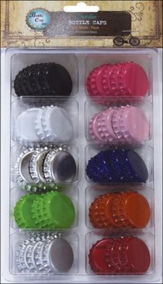 an assortment of different colored beads in a package