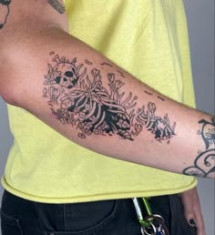 a man with a tattoo on his arm